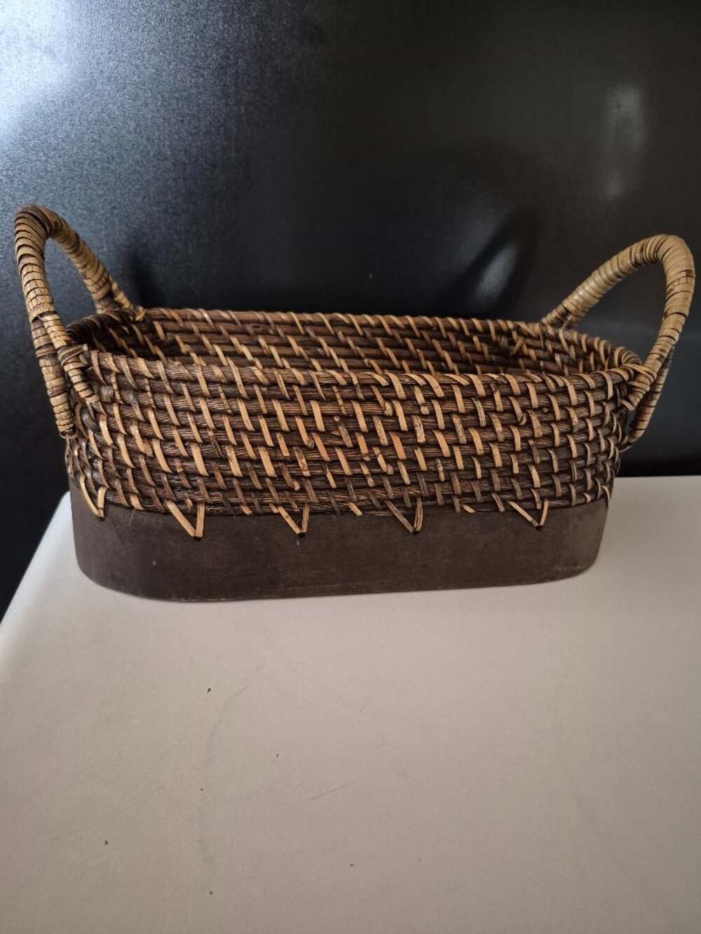 OVAL HAND-WOVEN WICKER STORAGE BASKET